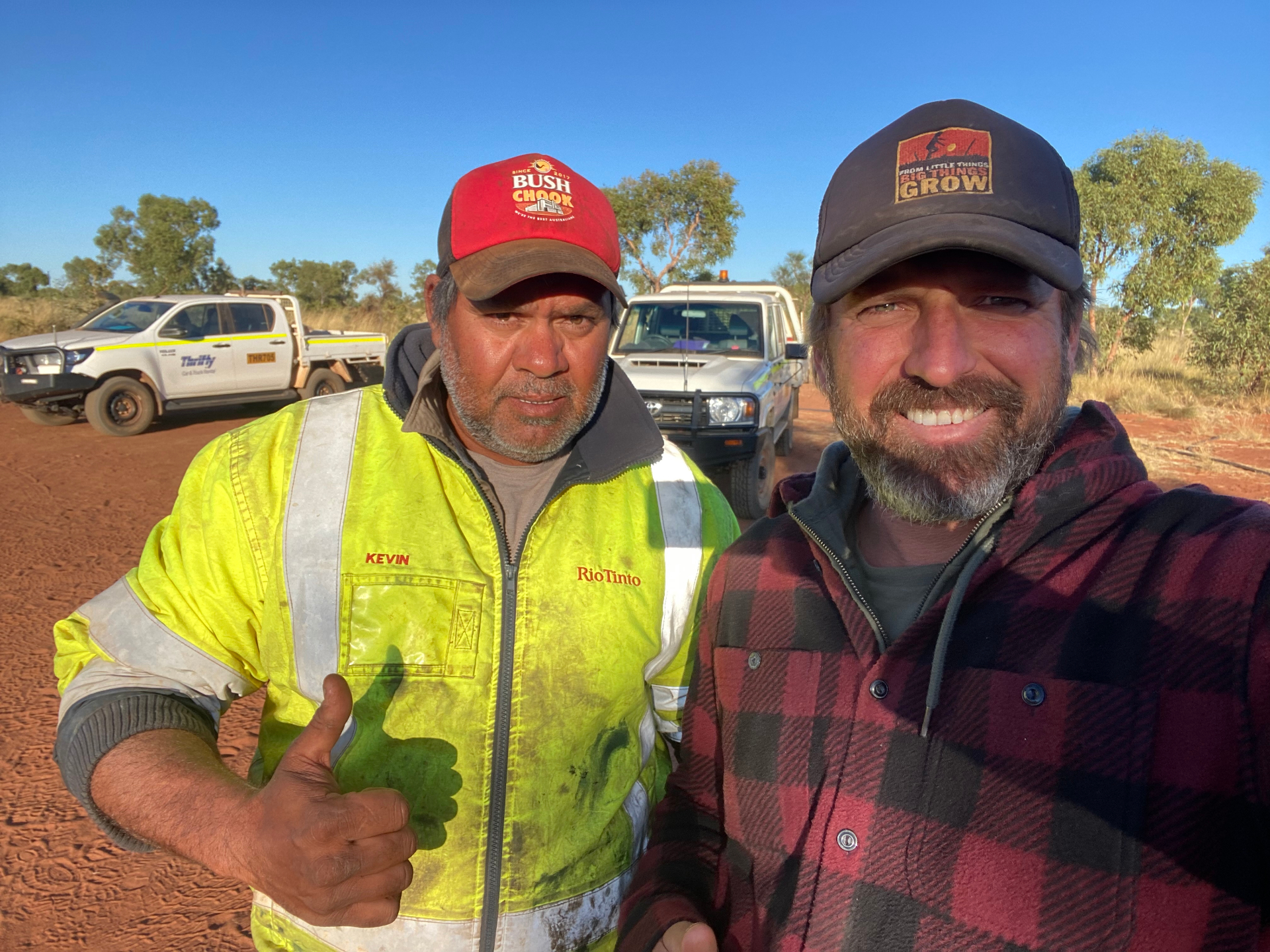 Kevin, a Rio Tinto worker, standing alongside Jon from Ngarranggarni Foundation on country in the Kimberley